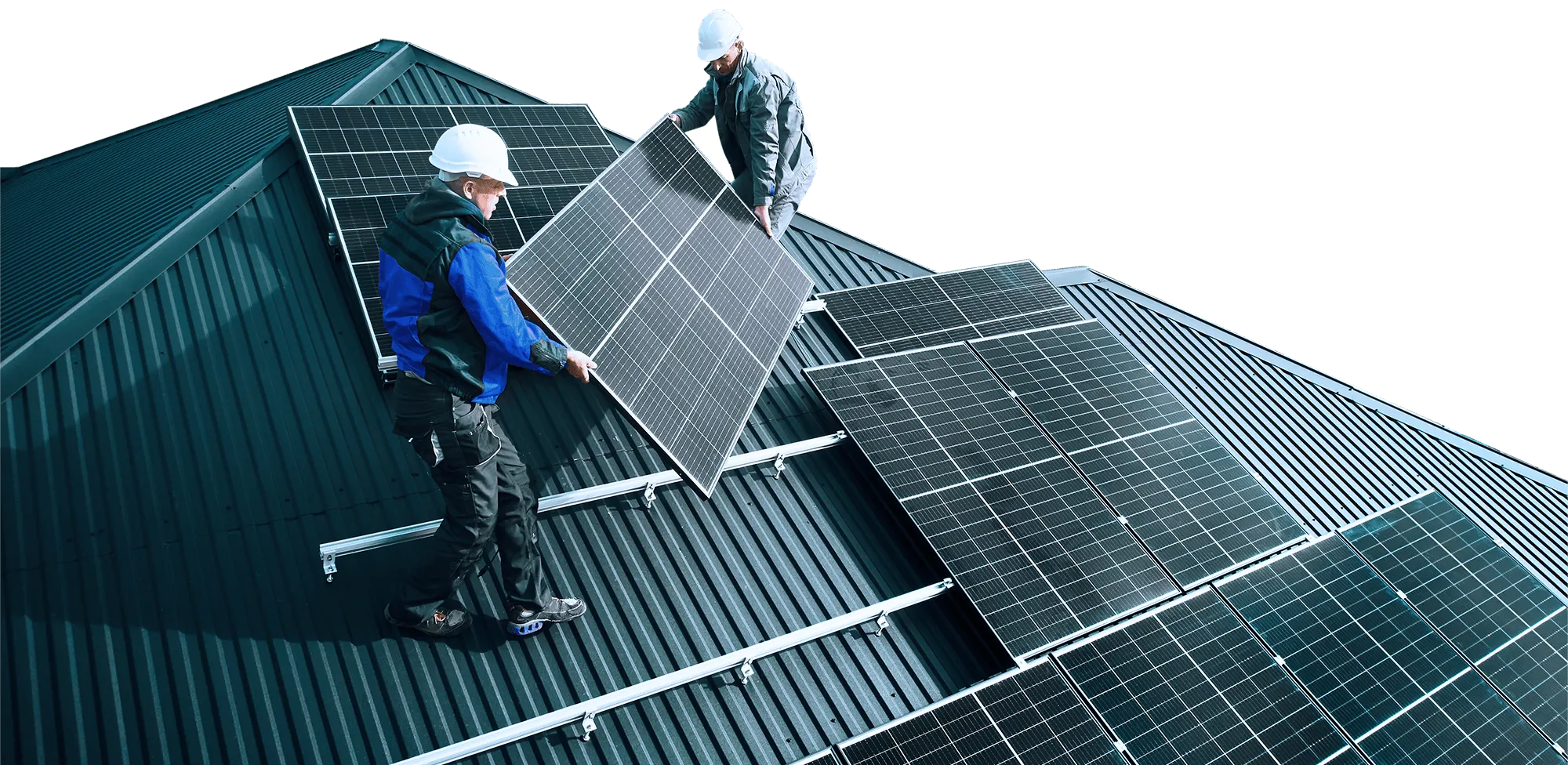 Vista aérea de painéis solares em telhados de edifícios com vegetação ao redor e céu nublado ao fundo.